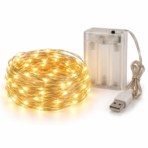 Fio de fada LED Sestriere de 10 metros aceso em luz quente, enrolado em fundo branco